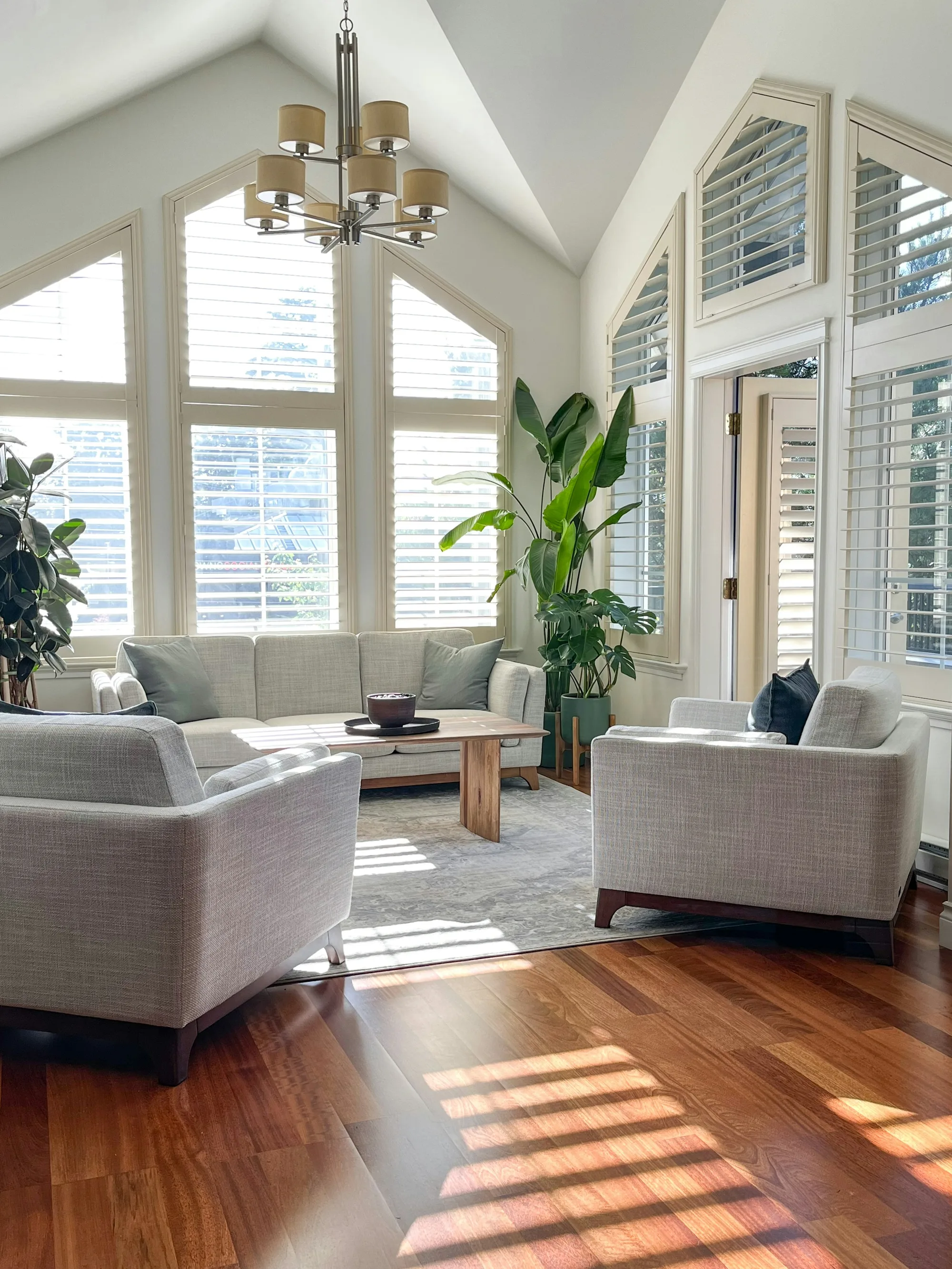 A bright, sunlit room with comfortable seating